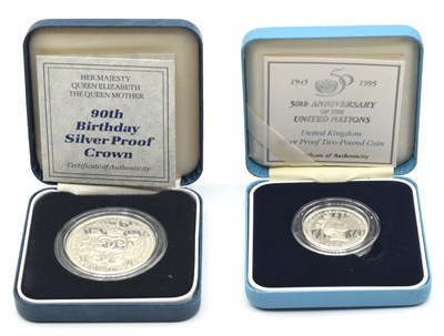 Lot 114 - Two cased Royal Mint silver coins to include...