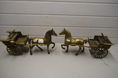Lot 73 - TWO BRASS HORSES AND CARTS