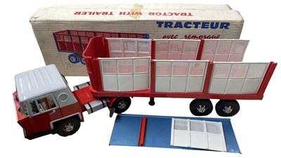 Lot 107 - A vintage pressed steel 'tractor and trailer'...