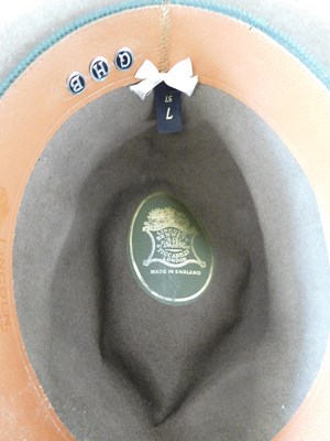 Lot 214 - Three hats, to include a bowler by Dunn & Co.,...