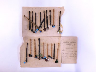 Lot 169 - An early 20th century card of lace bobbins, to...