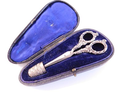 Lot 180 - A pair of early 20th century silver handled...