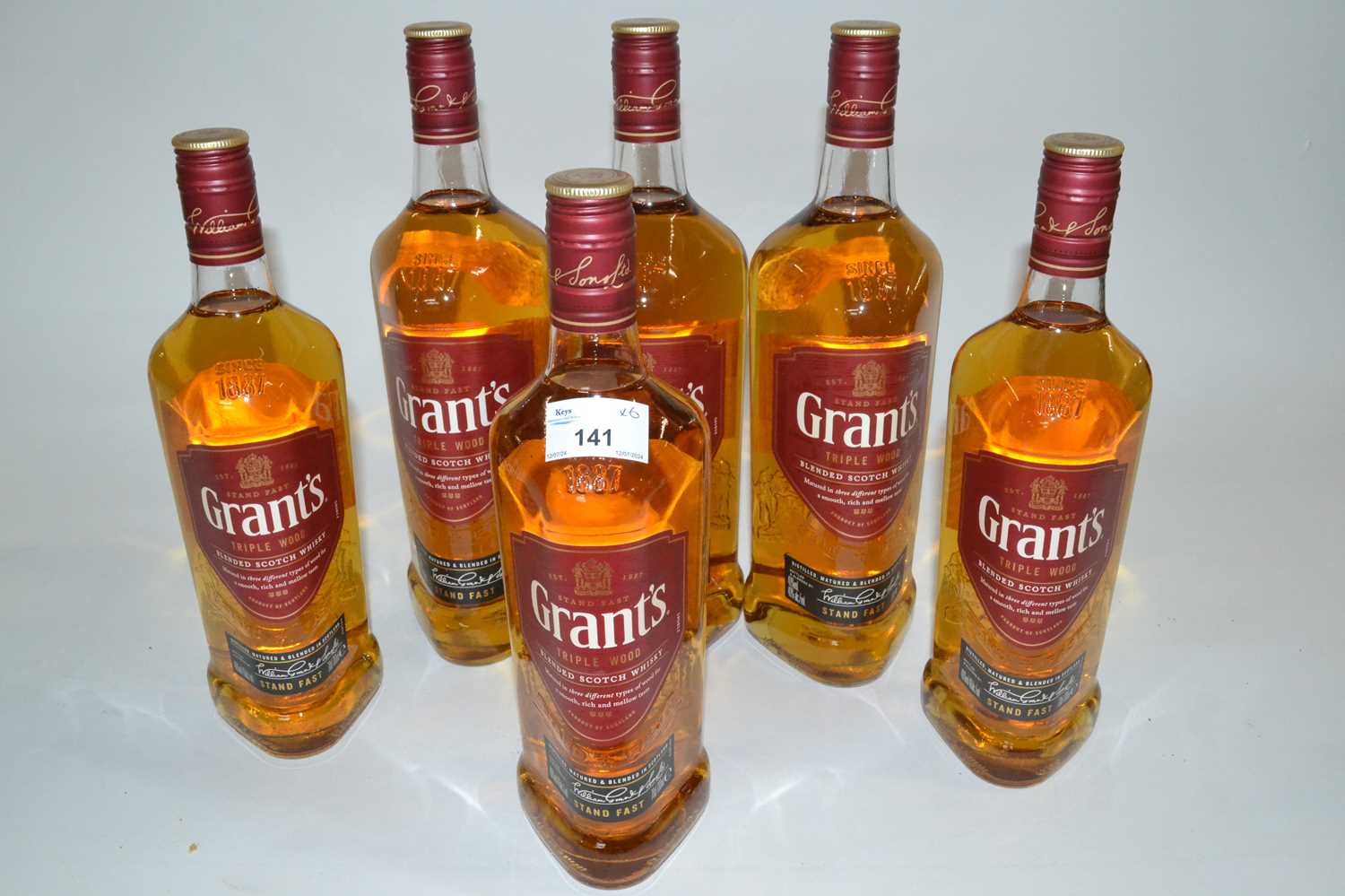 Lot 141 - Whisky to include 3 bottles of Grants Scotch...