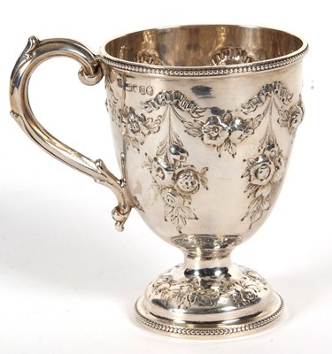 Lot 12 - A Victorian silver mug of trophy shape having...