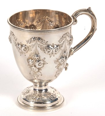 Lot 12 - A Victorian silver mug of trophy shape having...