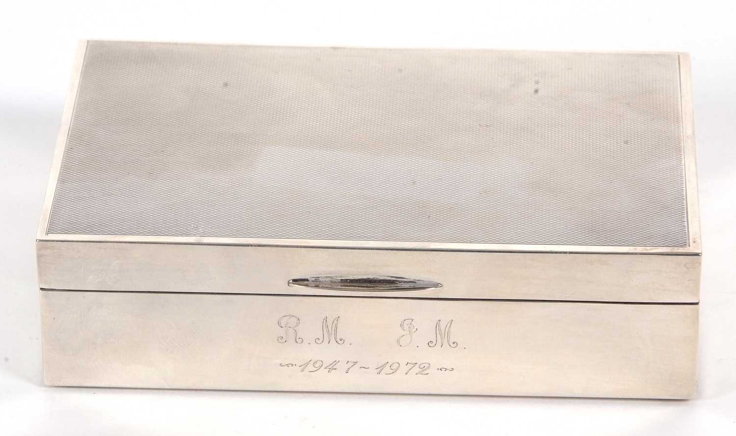 Lot 13 - An Elizabeth II silver cigarette box of...