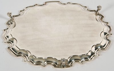Lot 20 - A sterling silver card salver of plain form,...