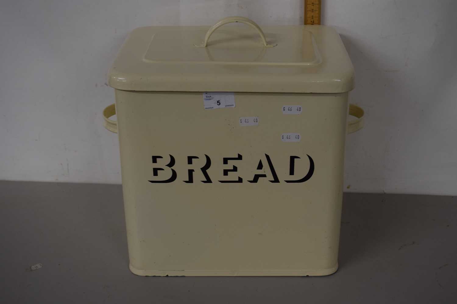 Lot 5 - An enamel bread bin