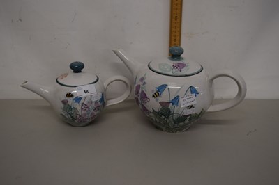 Lot 48 - Tain Pottery teapot and a similar smaller...