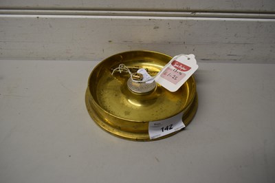 Lot 142 - BRASS ASHTRAY FORMED FROM THE END OF A SHELL...