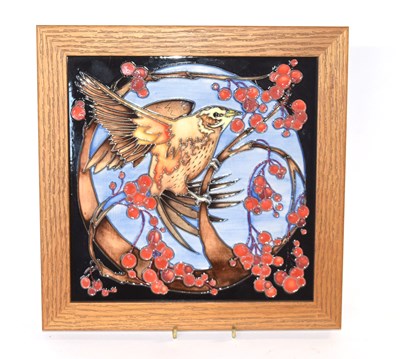 Lot 303 - A Moorcroft square plaque in oak frame, the...
