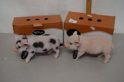 Lot 90 - Two boxed micro pig models