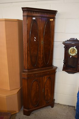 Lot 255 - A reproduction mahogany veneered corner drinks...