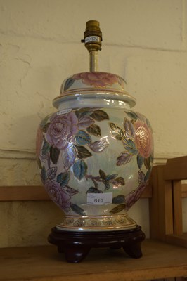 Lot 510 - A floral decorated ceramic table lamp