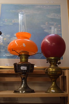 Lot 554 - Two oil lamps