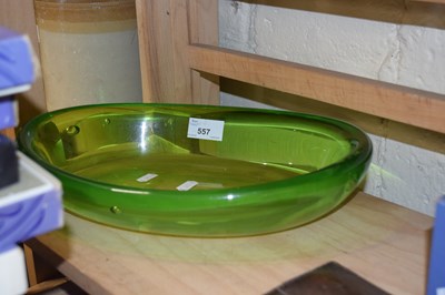 Lot 557 - A lime green glass bowl