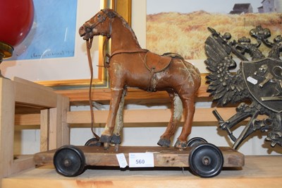 Lot 560 - A pull-along toy horse