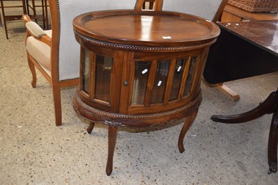 Lot 280 - Reproduction hardwood drinks cabinet of oval...