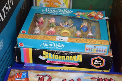 Lot 691 - Snow White and the Seven Dwarfs figurines,...