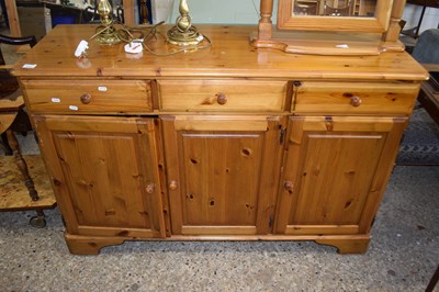 Lot 346 - A reproduction pine three door, three drawer...