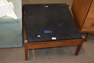 Lot 772 - A melomine topped coffee table