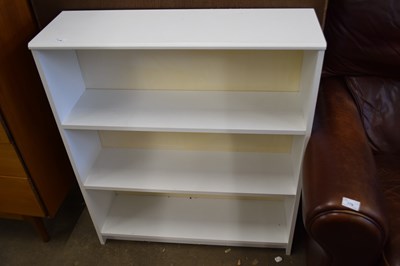 Lot 778 - A white four tiered free standing bookshelf