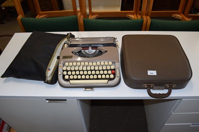 Lot 846 - Portable typewriter and accompanying folder