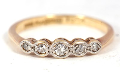 Lot 310 - An 18ct gold and five diamond ring, circa 1920