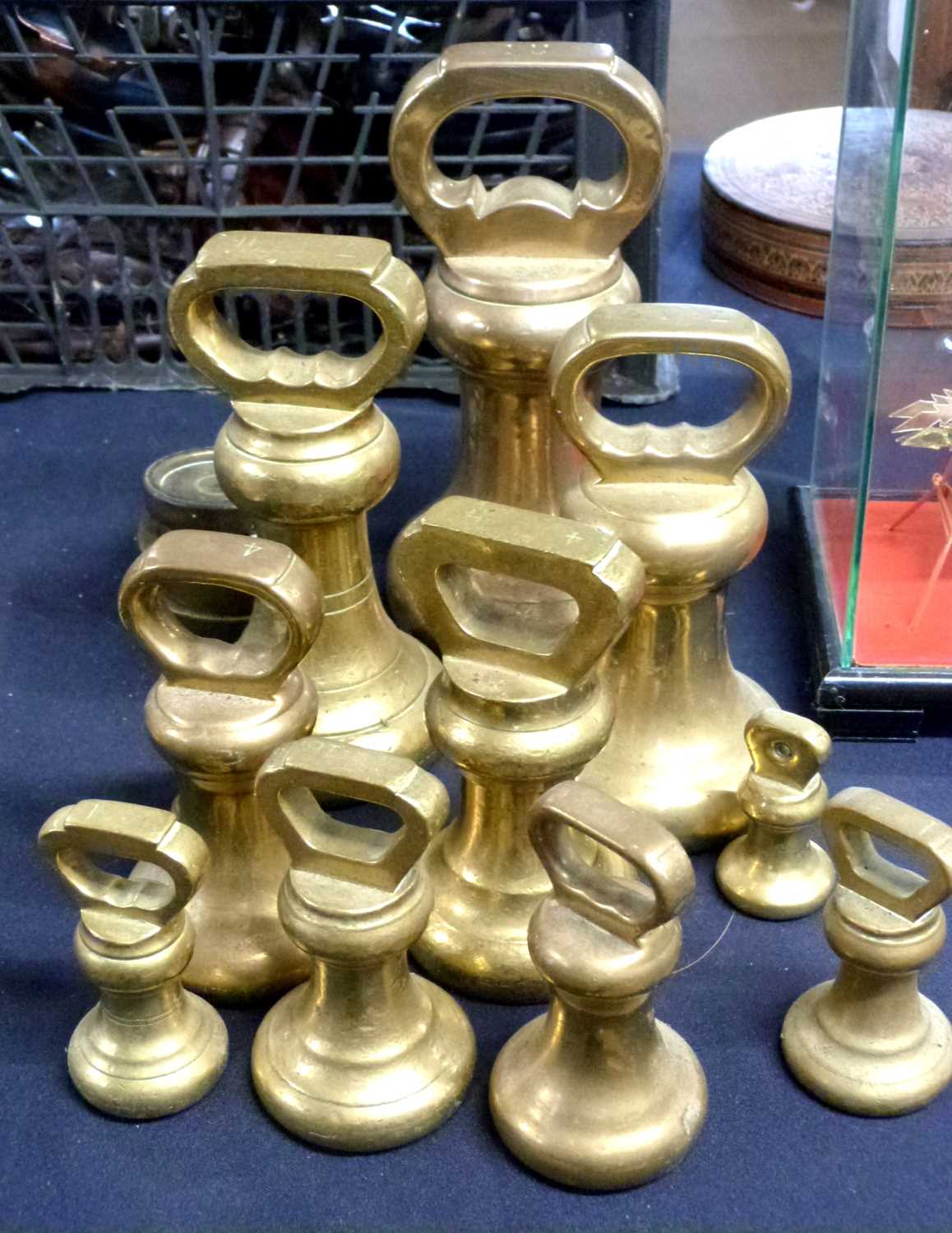 Lot 282 - A group of brass butchers bell weights and...