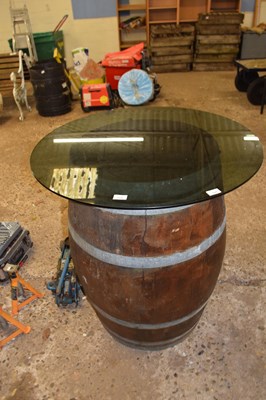 Lot 1045 - Oak barrel glass topped bar table