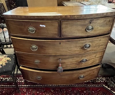 Lot 454 - A late Georgian mahogany bow front five drawer...