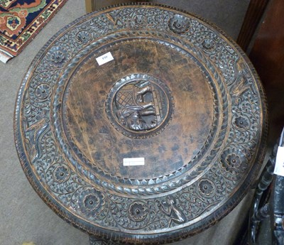 Lot 462 - An Indian hardwood occasional table with...