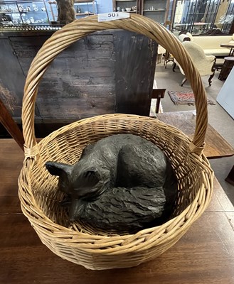 Lot 501 - Bronzed resin model of a sleeping fox...