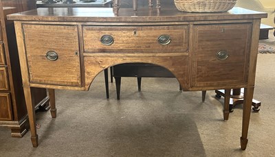 Lot 503 - An Edwardian mahogany bow front sideboard in...