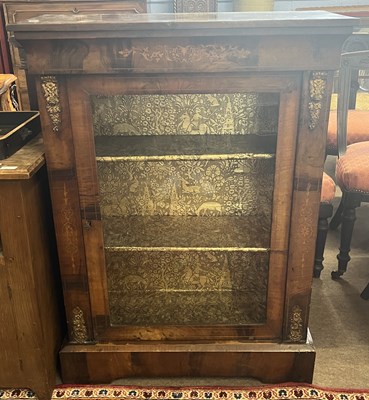 Lot 519 - A Victorian walnut veneered pier cabinet of...