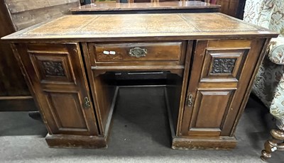 Lot 509 - A late Victorian American walnut twin pedestal...