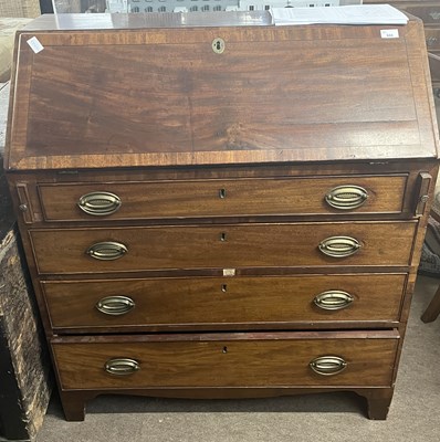 Lot 533 - A late Georgian mahogany bureau of typical...