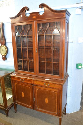 Lot 548 - An Edwardian mahogany side cabinet with broken...