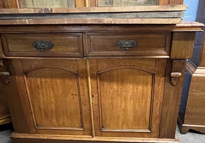 Lot 487 - A late Victorian oak bookcase cabinet formed...