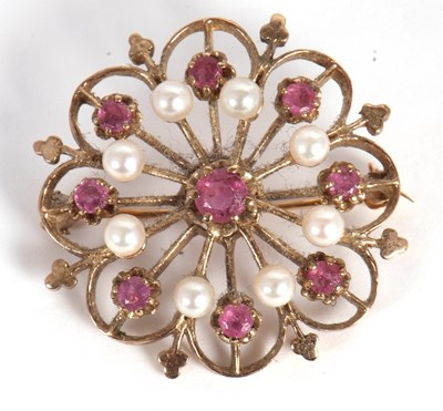 Lot 77 - A 9ct cultured pearl and ruby brooch, set to...