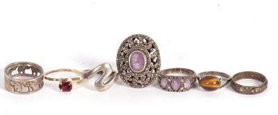 Lot 135 - A group of silver and gemset rings, to include...