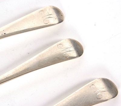 Lot 43 - Four George III silver tablespoons, initialled,...