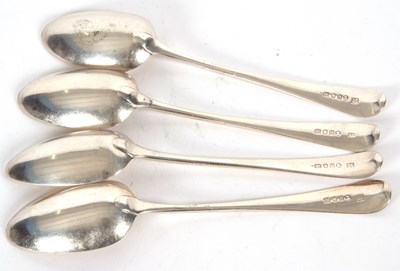 Lot 43 - Four George III silver tablespoons, initialled,...