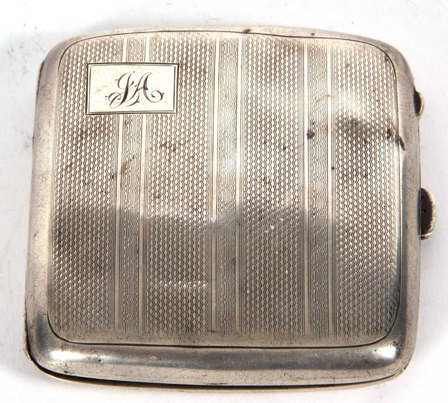 Lot 46 - A George V silver cigarette case of square...