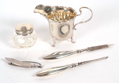 Lot 47 - Mixed Lot: A small George V silver cream jug...