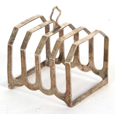 Lot 49 - An Art Deco silver toast rack of angular form,...
