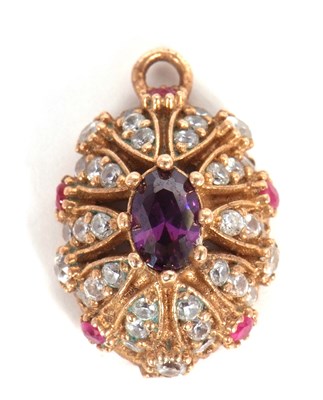 Lot 58 - An amethyst, ruby and white stone pendant, the...