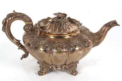 Lot 81 - A William IV melon shaped teapot with leaf...