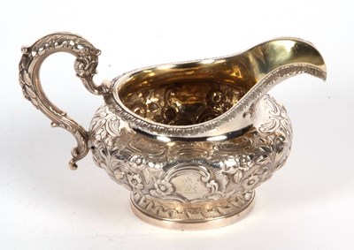 Lot 96 - A William IV silver cream jug of compressed...