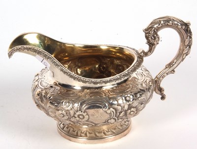 Lot 96 - A William IV silver cream jug of compressed...